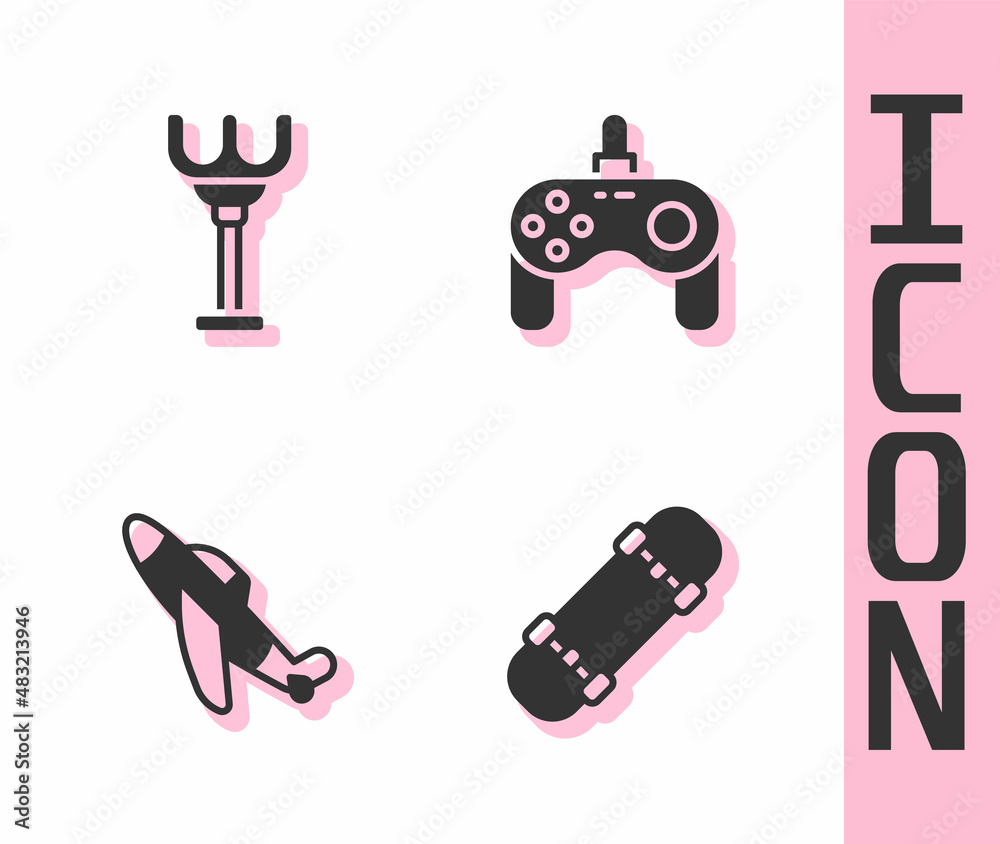 Set Skateboard, Rake toy, Toy plane and Gamepad icon. Vector