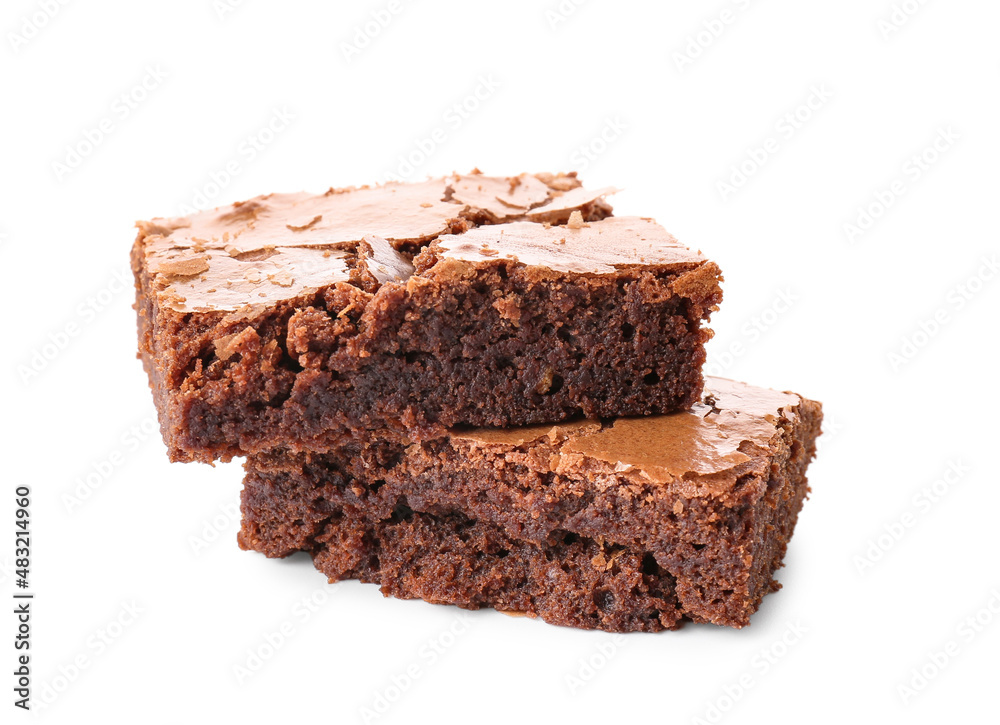 Pieces of tasty chocolate brownie isolated on white background