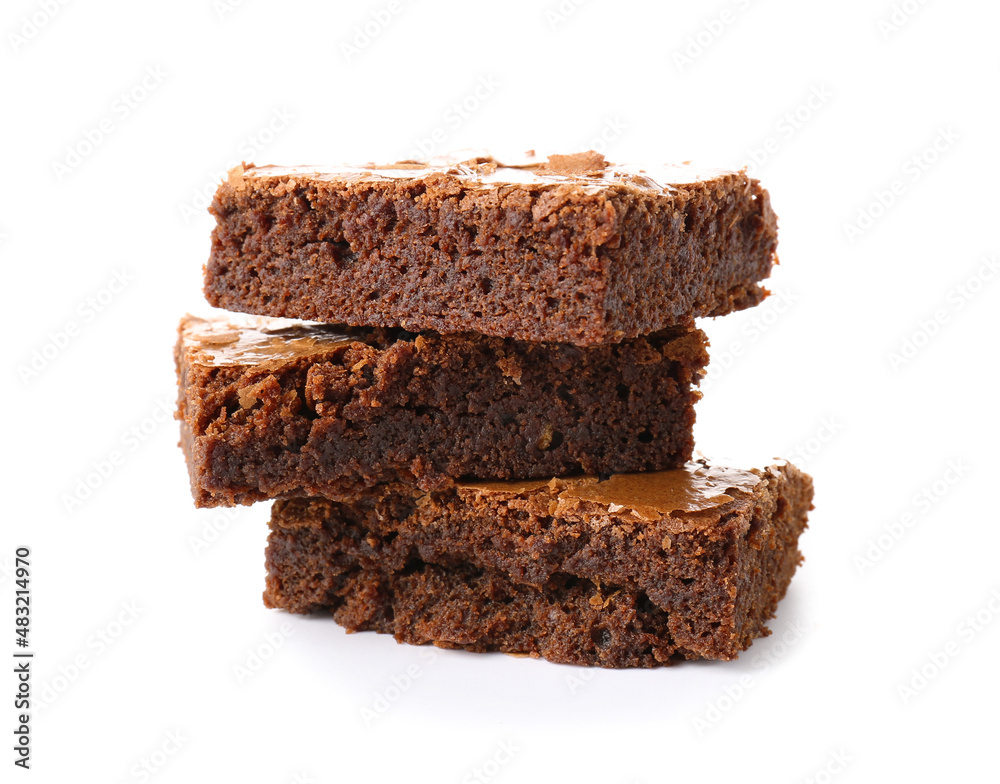 Pieces of tasty chocolate brownie isolated on white background