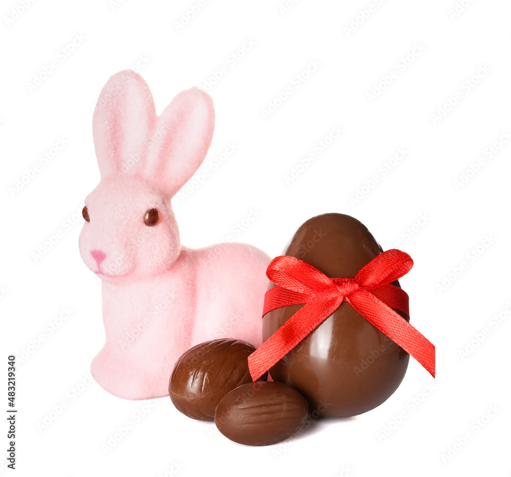 Chocolate Easter egg with rabbit isolated on white background