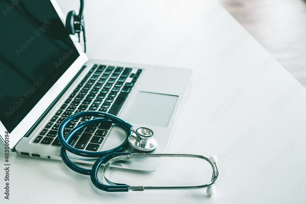 Headset and doctor equipment at clinic ready for actively support for patient by online video call .