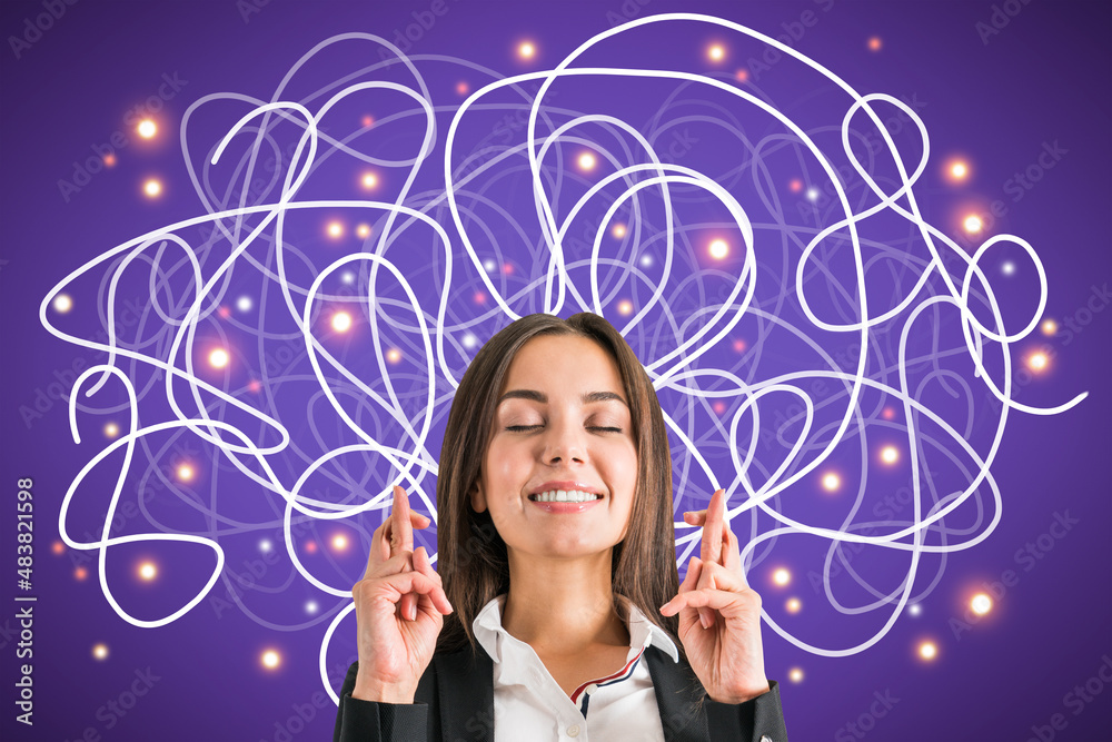 Attractive young european businesswoman with crossed fingers and abstract scribble on purple backgro