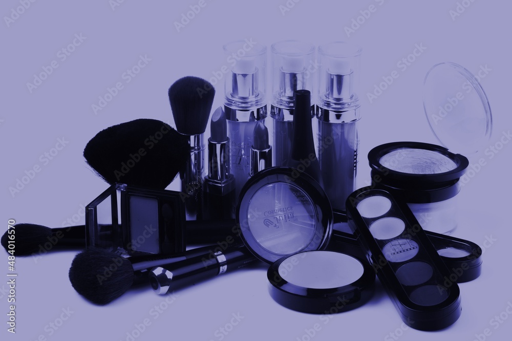 Makeup cosmetic product on background. New 2022 trending PANTONE Very Peri color