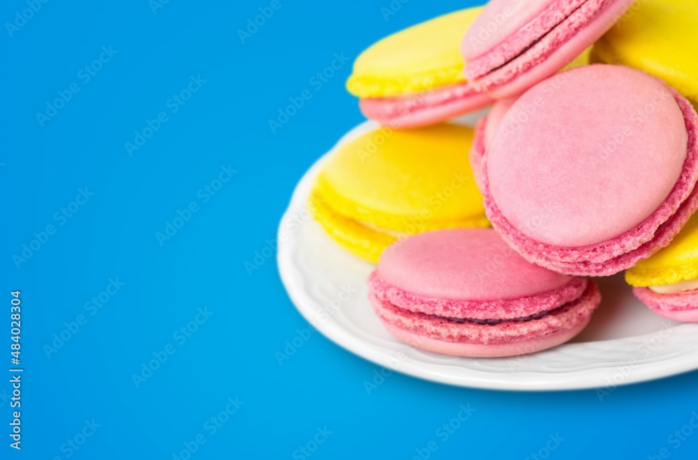 Tasty sweet macarons cakes of different colors. Culinary and cooking concept.