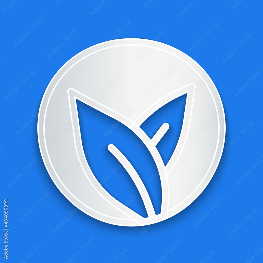 Paper cut Tea leaf icon isolated on blue background. Tea leaves. Paper art style. Vector