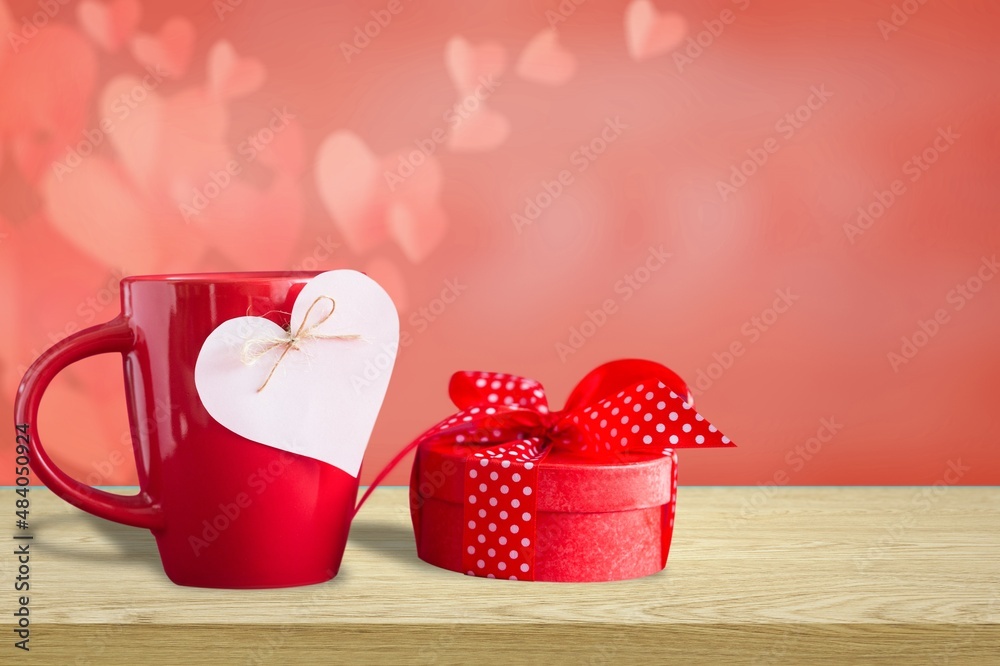 Cups full of love.  A hot heart in a tender embrace. Perfect texture for a greeting card for a loved