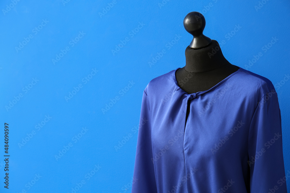 Mannequin with elegant dress on color background, closeup