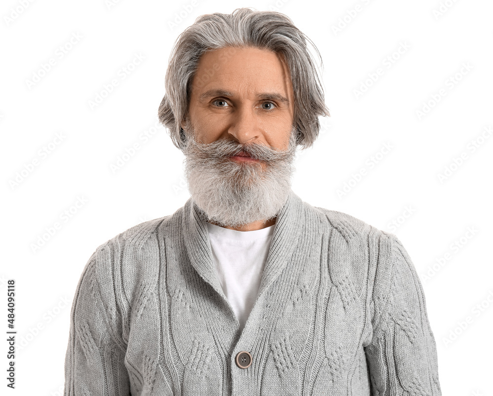 Handsome senior man in knitted sweater on white background