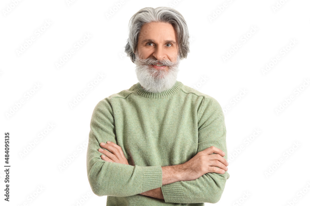 Handsome senior man in knitted sweater on white background