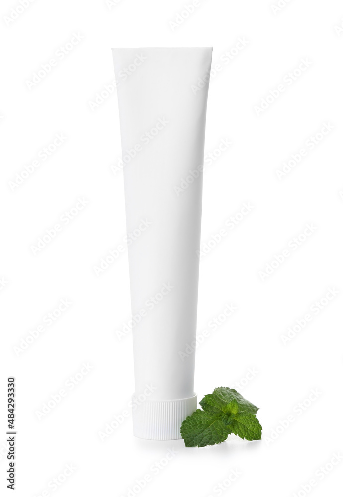 Tooth paste with mint on white background