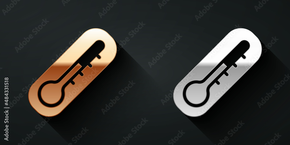 Gold and silver Meteorology thermometer measuring heat and cold icon isolated on black background. T