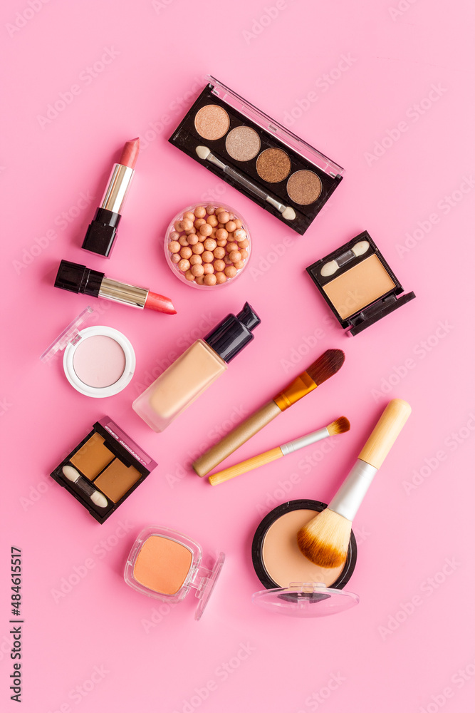 Flat lay of decorative makeup cosmetic products, top view