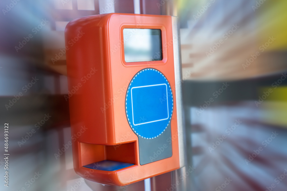 Close-up of a punch card on a modern public bus