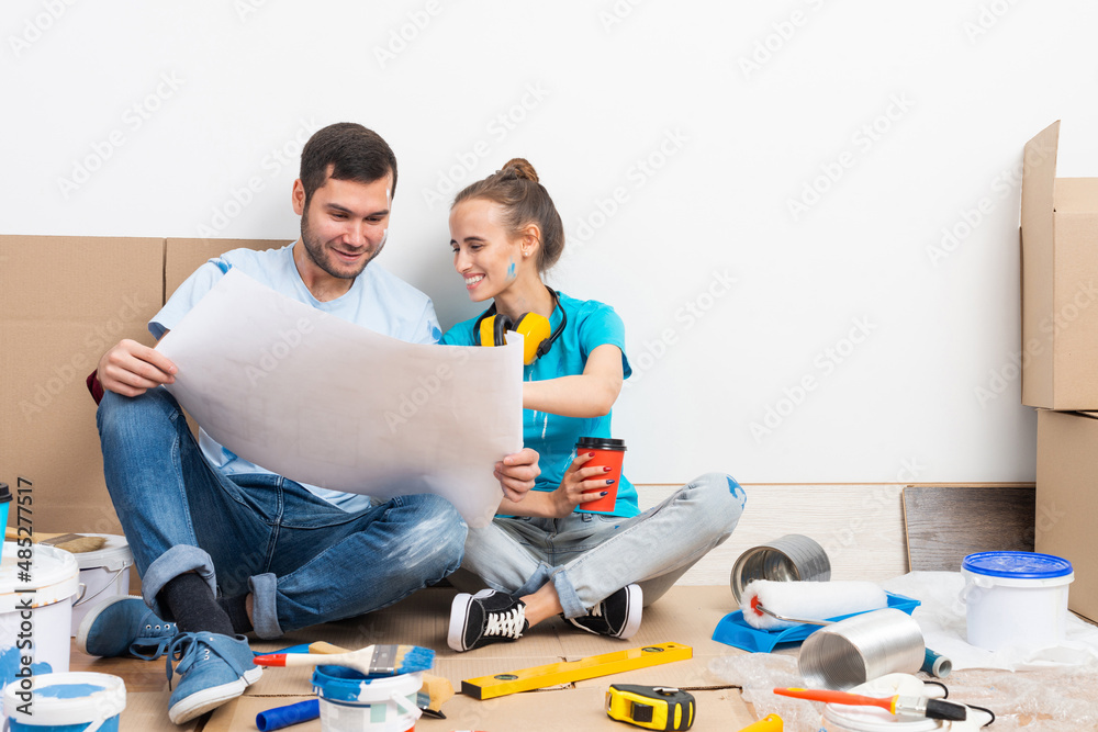 Couple discussing renovating plan of their home.