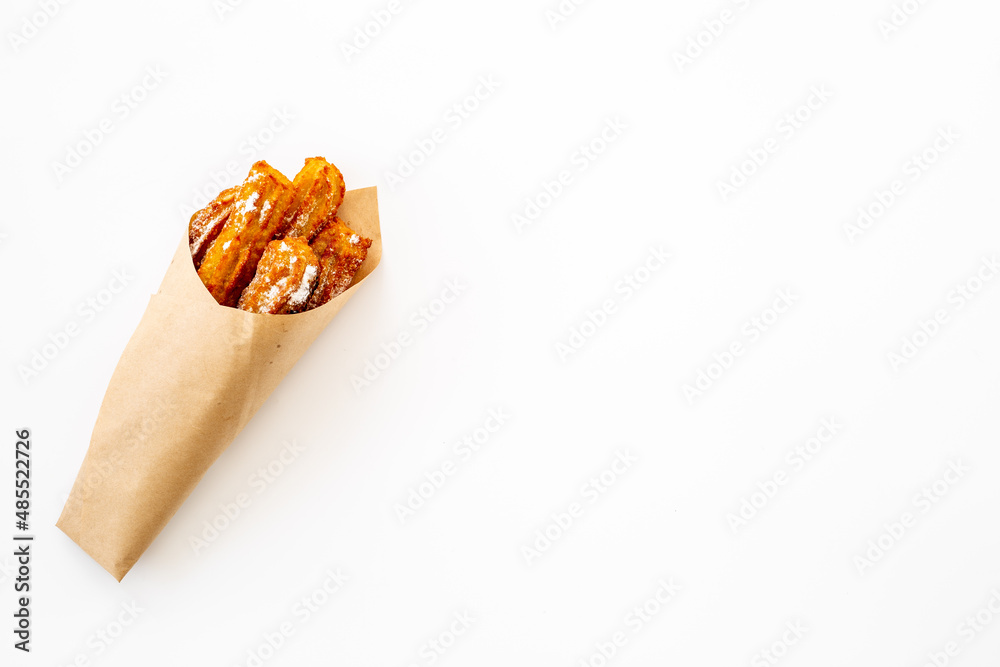 Fast food sweets - churros in paper bag