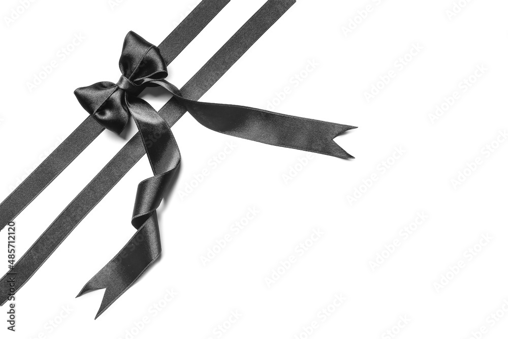 Black ribbons with bow isolated on white