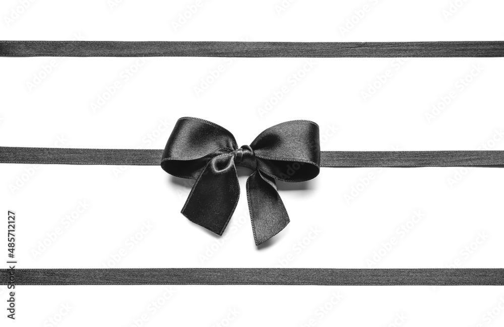 Black ribbons with bow isolated on white