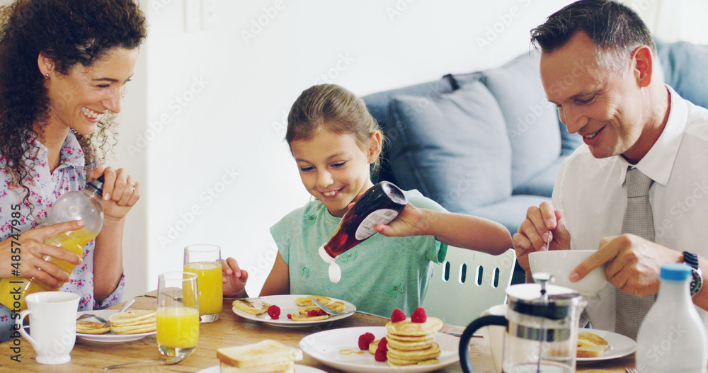 Start each morning with the people who matter the most. Shot of a cute little girl having breakfast 