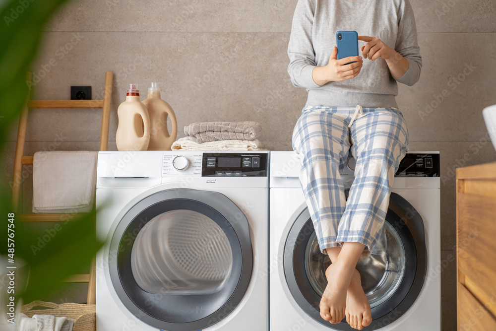 woman is doing laundry