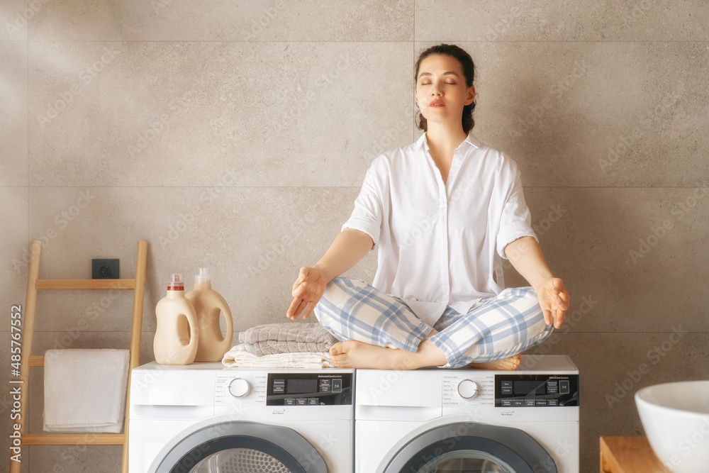 woman is doing laundry