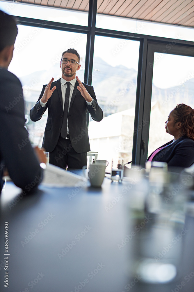 Ironing out the details. Shot of corporate businesspeople meeting in the boardroom.