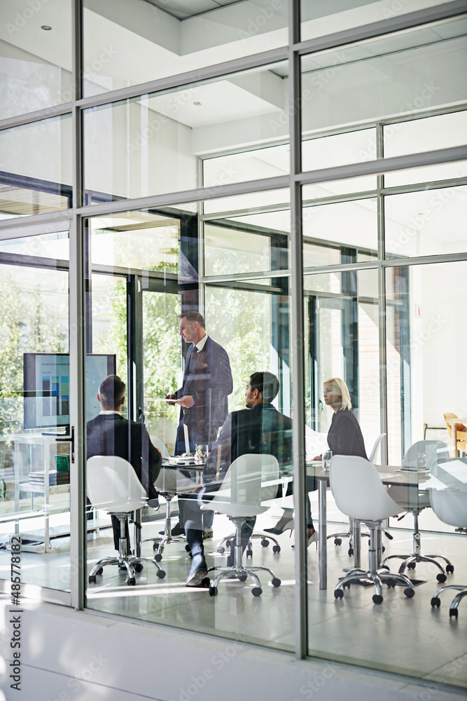 Ironing out the details. Shot of corporate businesspeople meeting in the boardroom.