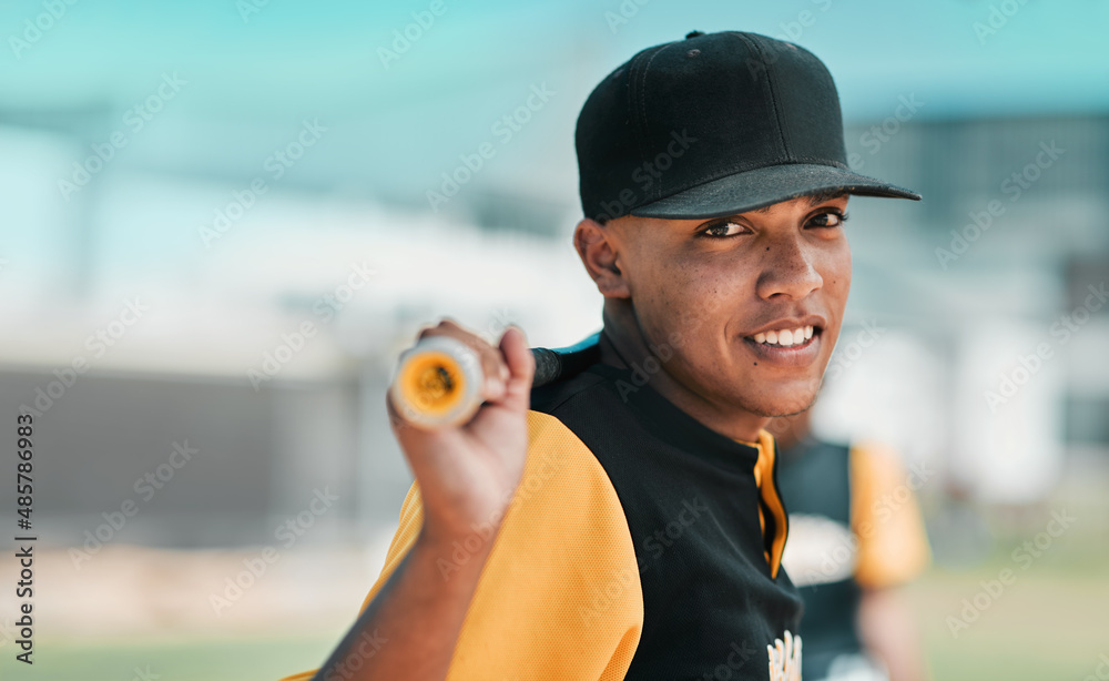 Baseball is without a doubt my favourite sport. Shot of a young baseball player holding a baseball b