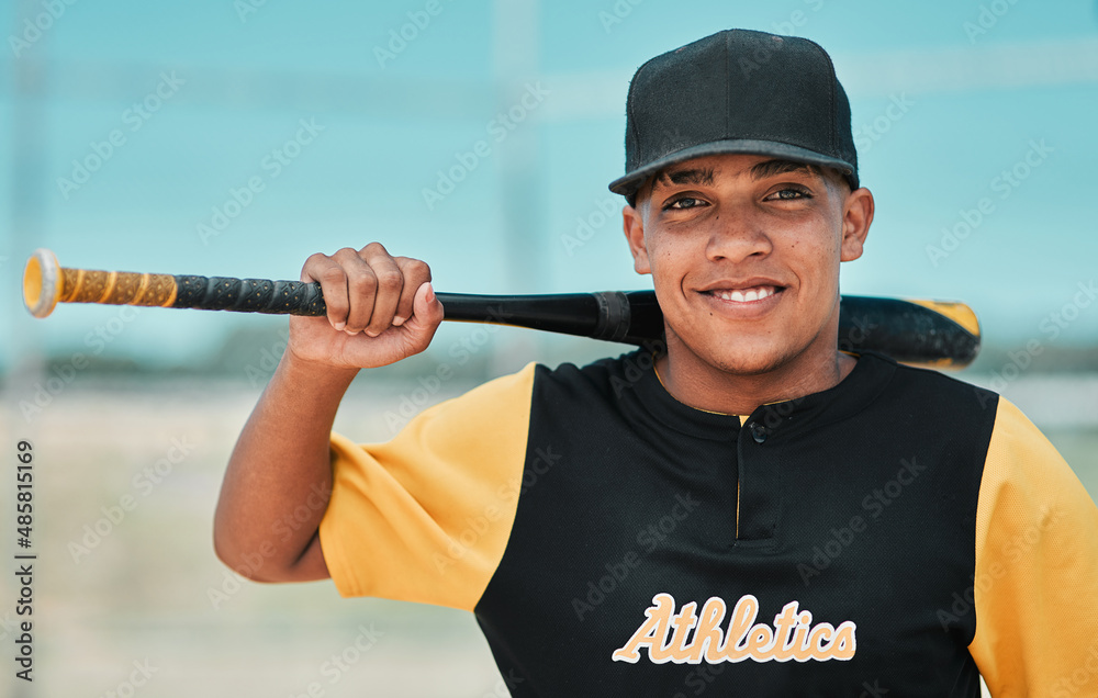 Im going pro in a few years. Shot of a young baseball player holding a baseball bat while posing out