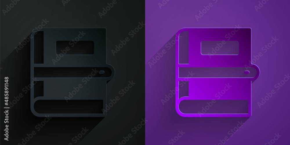 Paper cut Book icon isolated on black on purple background. Paper art style. Vector