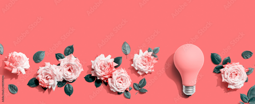 Light bulb with pink roses - flat lay