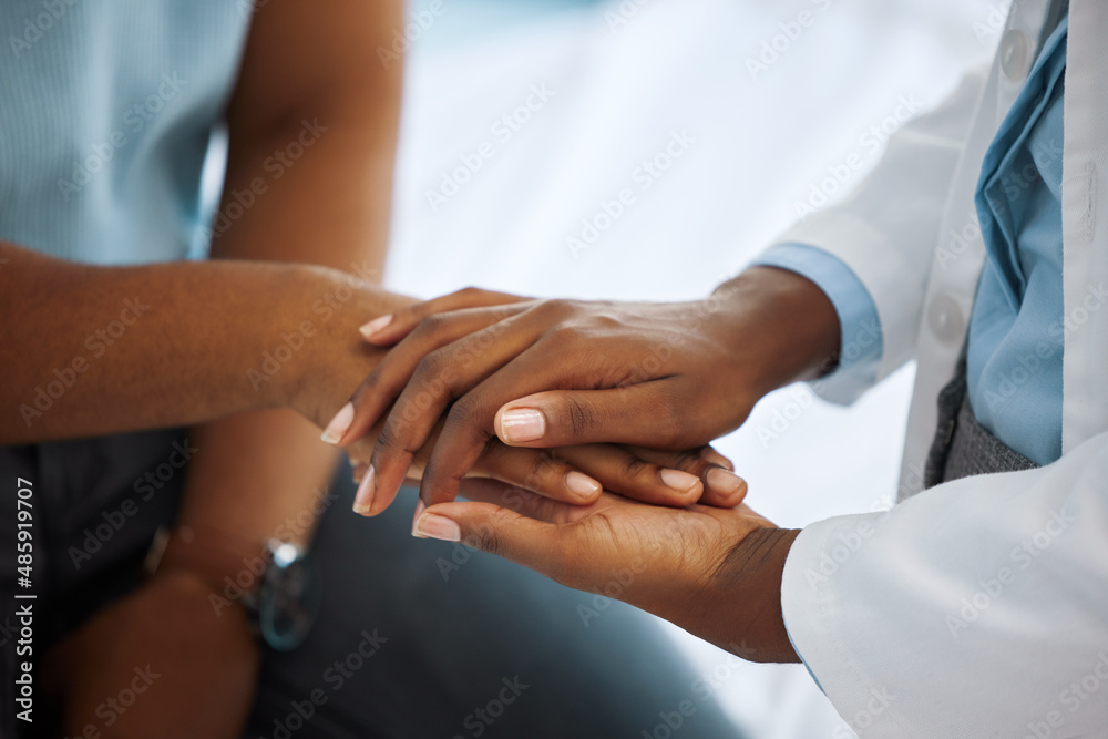 Well get through this together. Shot of a doctor comforting a patient.