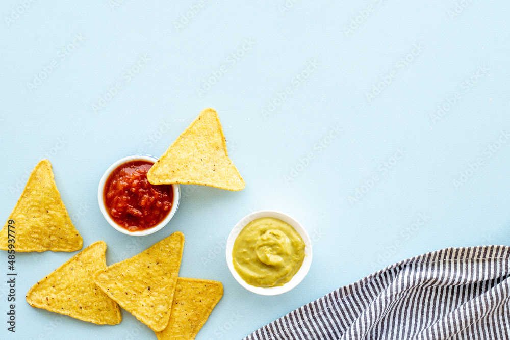 Snack for party corn nachos with salsa and guacamole sauces