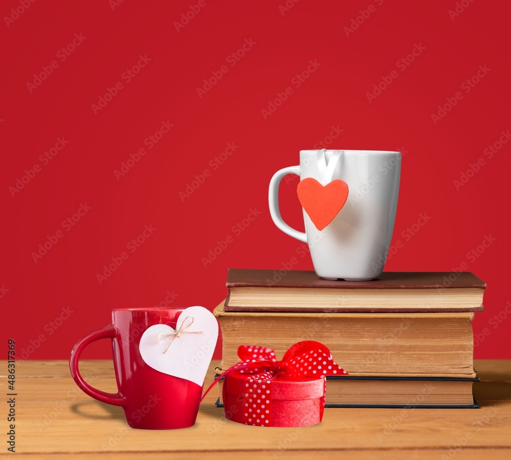 Cups full of love.  A hot heart in a tender embrace. Perfect texture for a greeting card for a loved