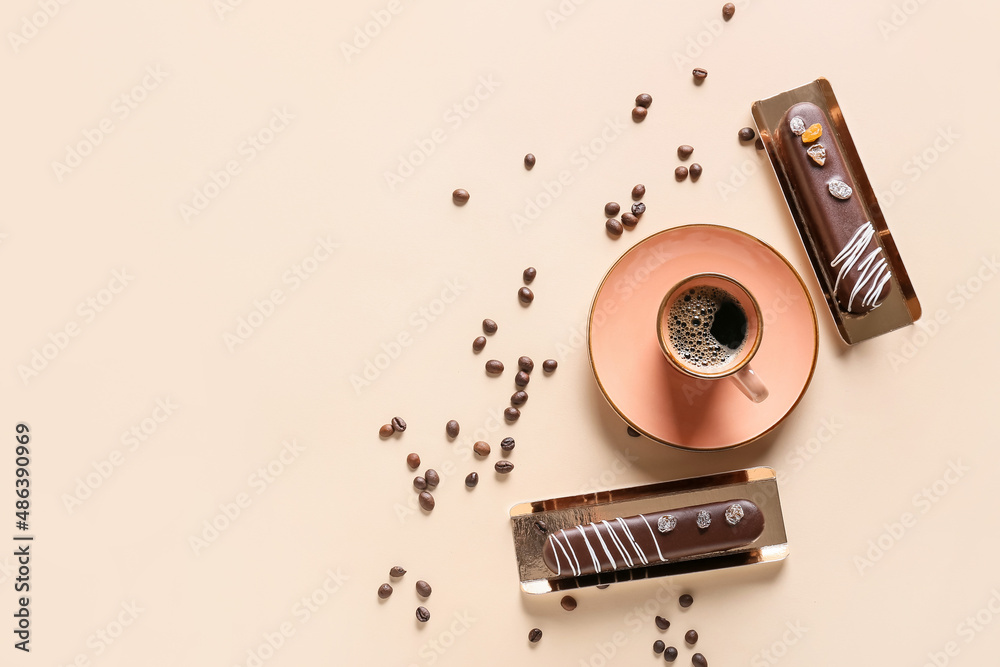 Delicious chocolate cakes and cup of coffee on light background