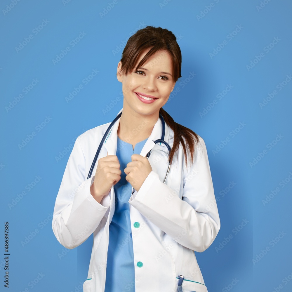 Medical concept of beautiful female doctor in coat with a stethoscope. Medical student.