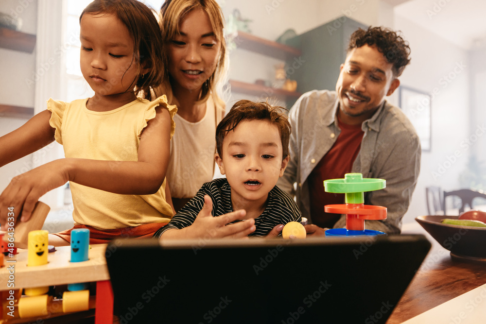 Young boy speaking expressively on a video call