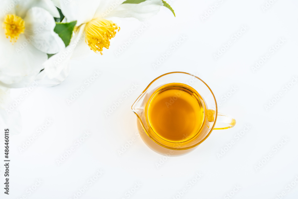 A bottle of golden camellia oil