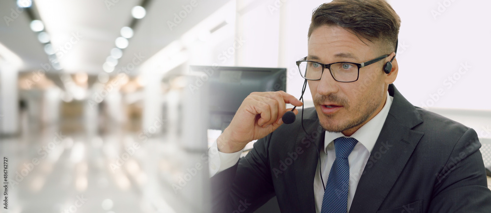 Business people wearing headset working in office to support remote customer or colleague. Call cent