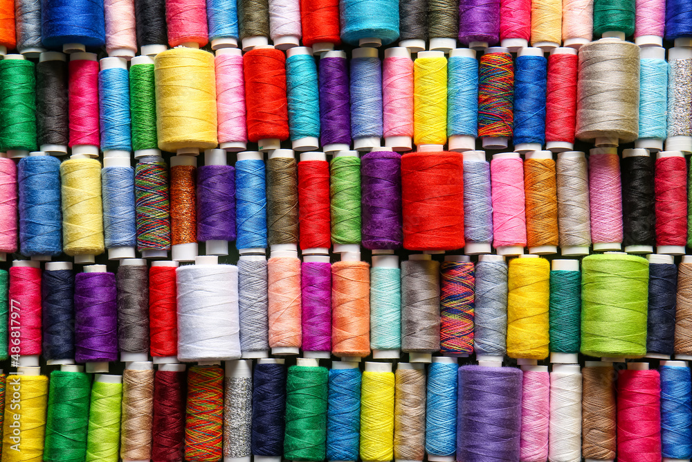 Pattern made of spools with colorful sewing threads