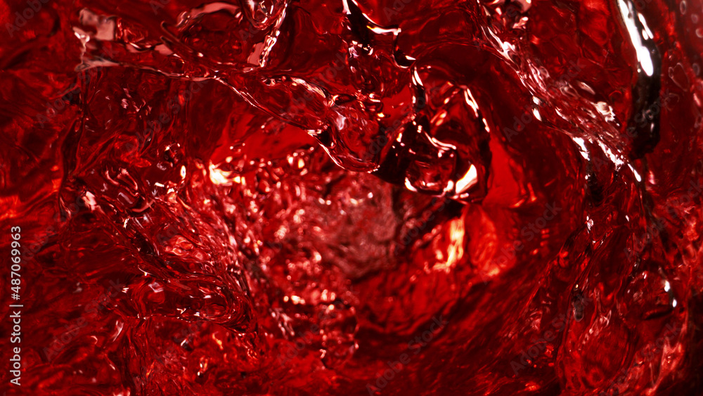 Abstract whirl shape of red wine, mixing liquid concept.