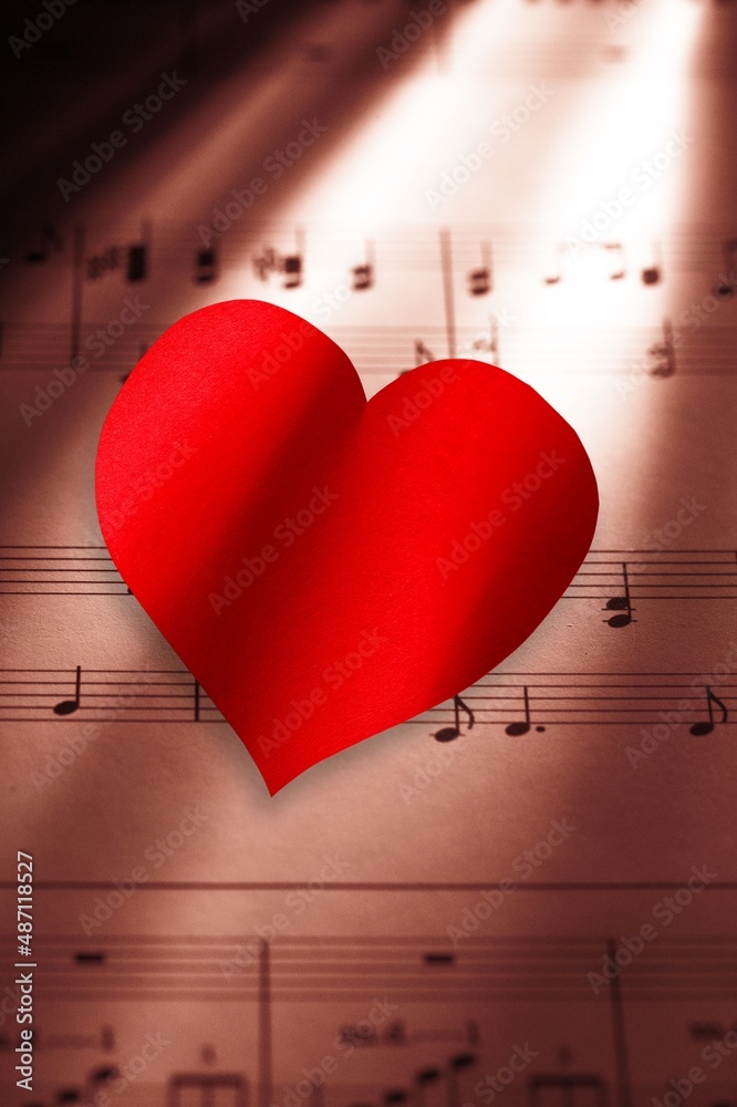 Small red heart with musical notes