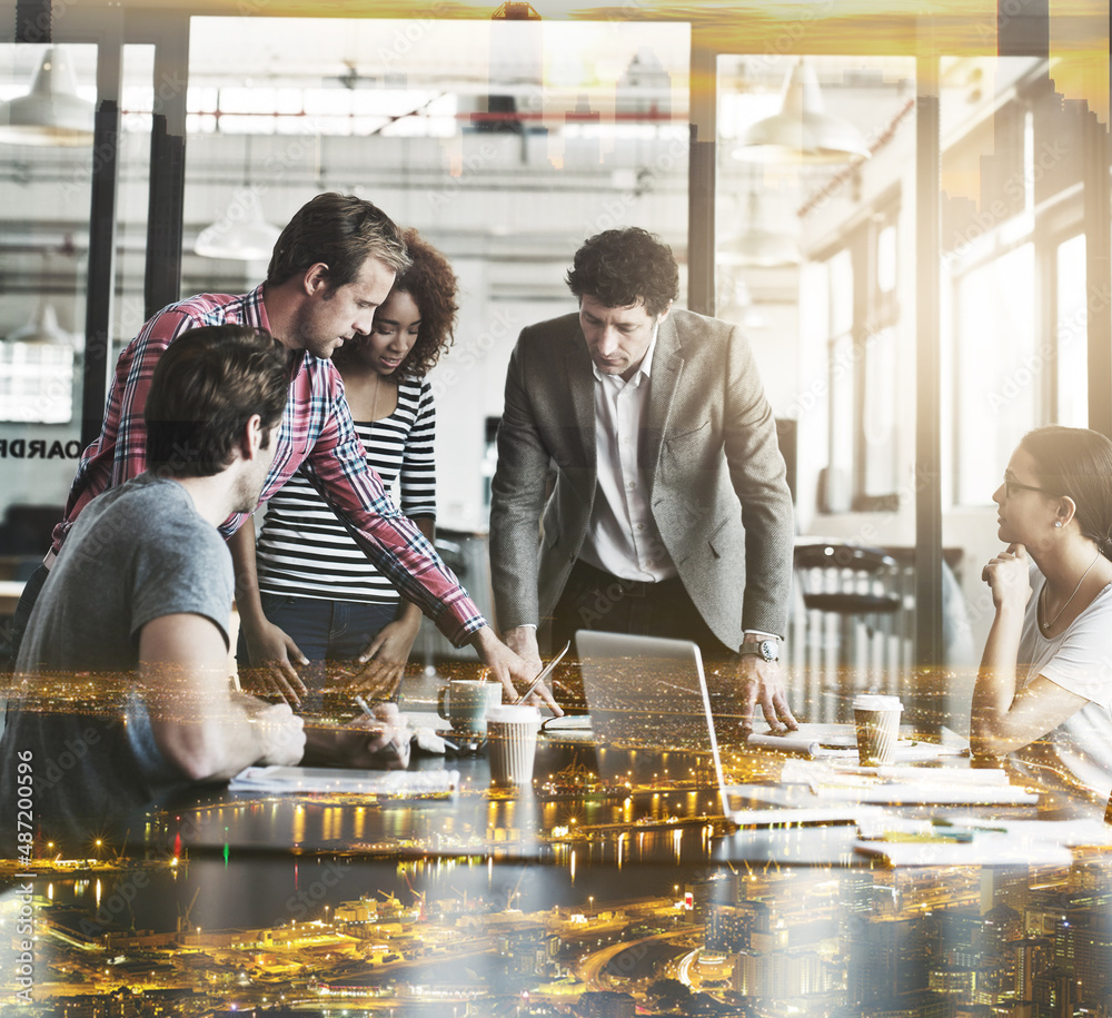 Brainstorming with the best in the city. Multiple exposure shot of a business meeting superimposed o