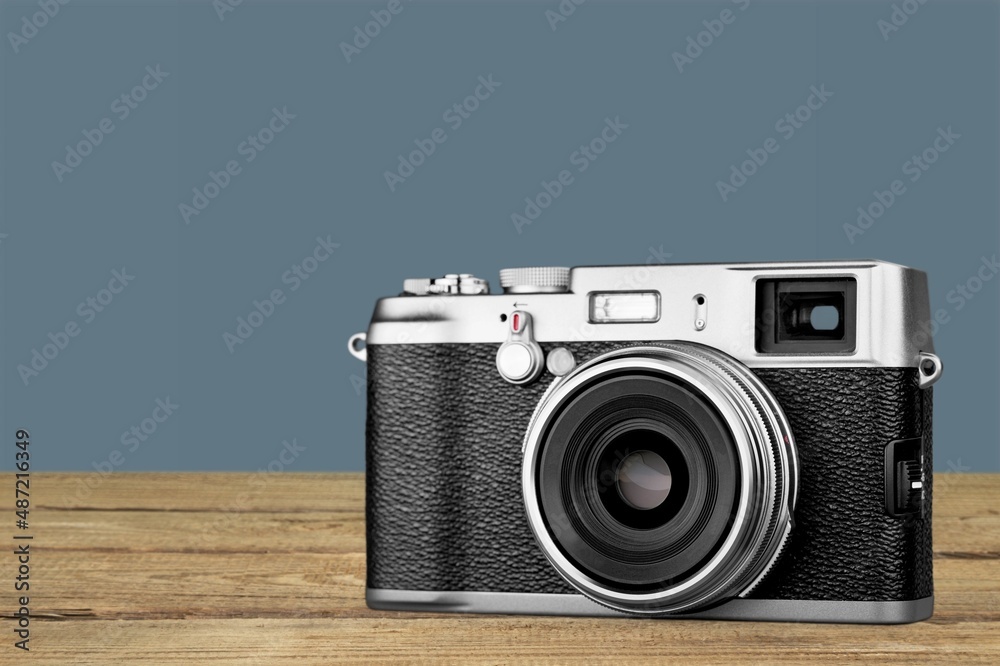 Classic vintage Camera on the wooden desk