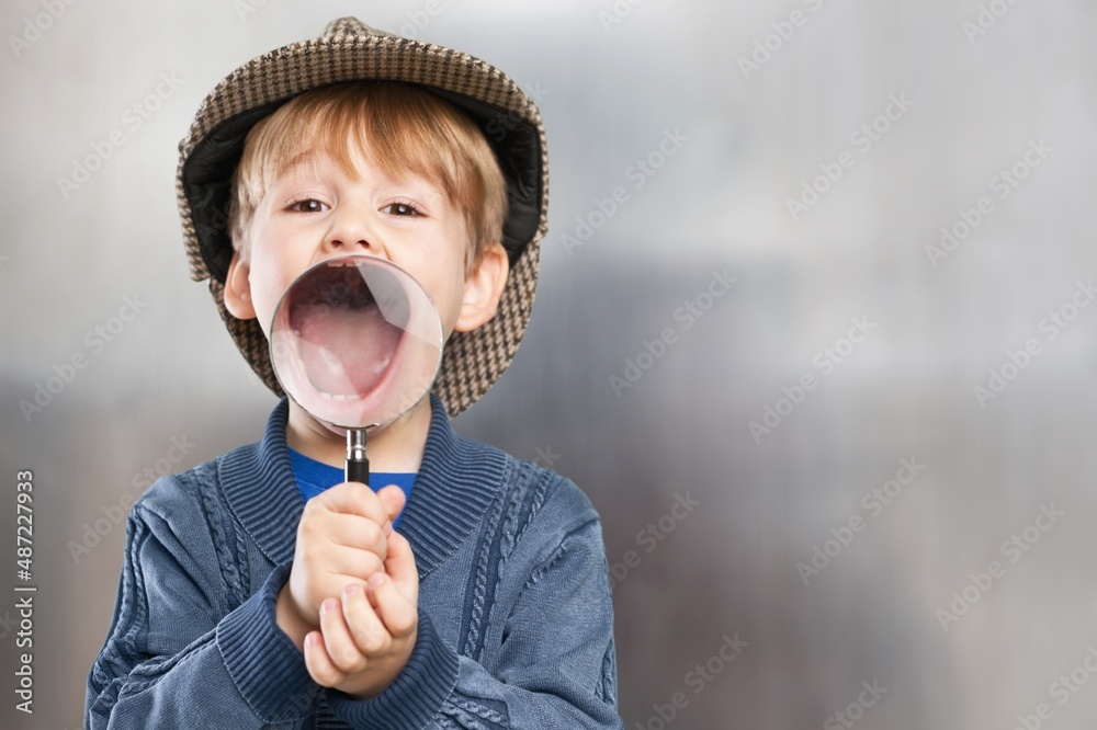 portrait of a little boy kid wearing an antique hat