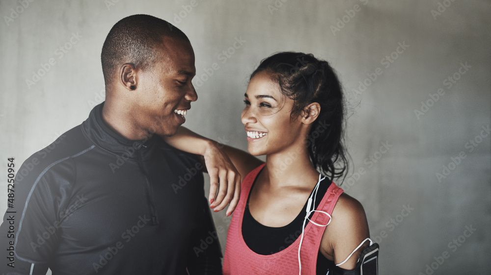 They love staying fit together. Shot of a sport young couple out for a run.