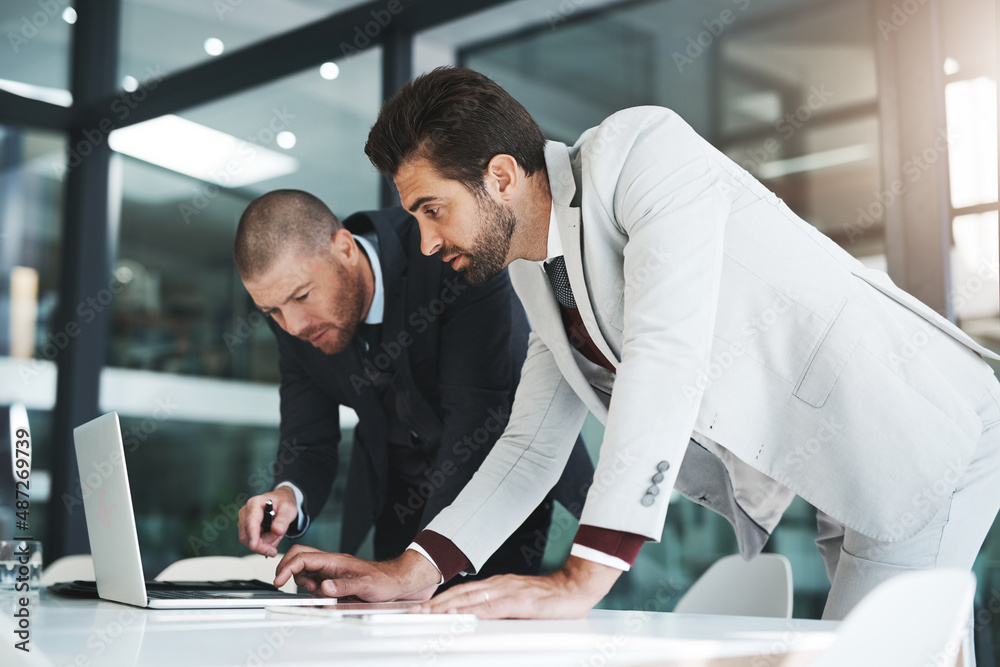 Lets email the client what we have so far. Cropped shot of businesspeople working together in the of