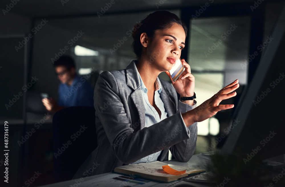 Success is built on hard work. Cropped shot of a young attractive businesswoman working late at nigh