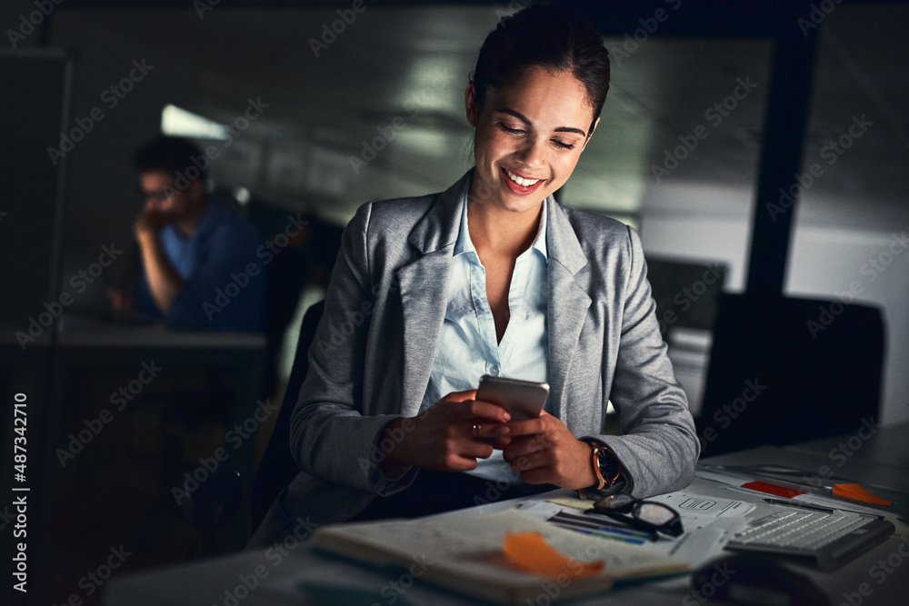 Success will come to those who work for it. Shot of a young attractive businesswoman working late at