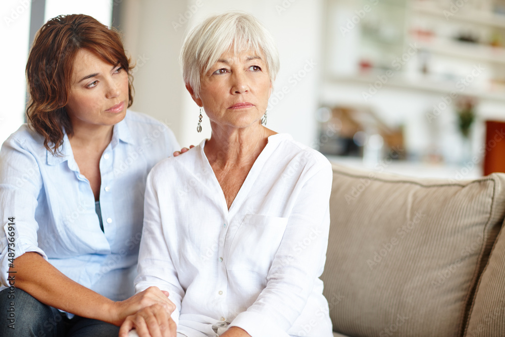 Whats on your mind, Mom. Shot of a woman supporting her elderly mother through a difficult time.