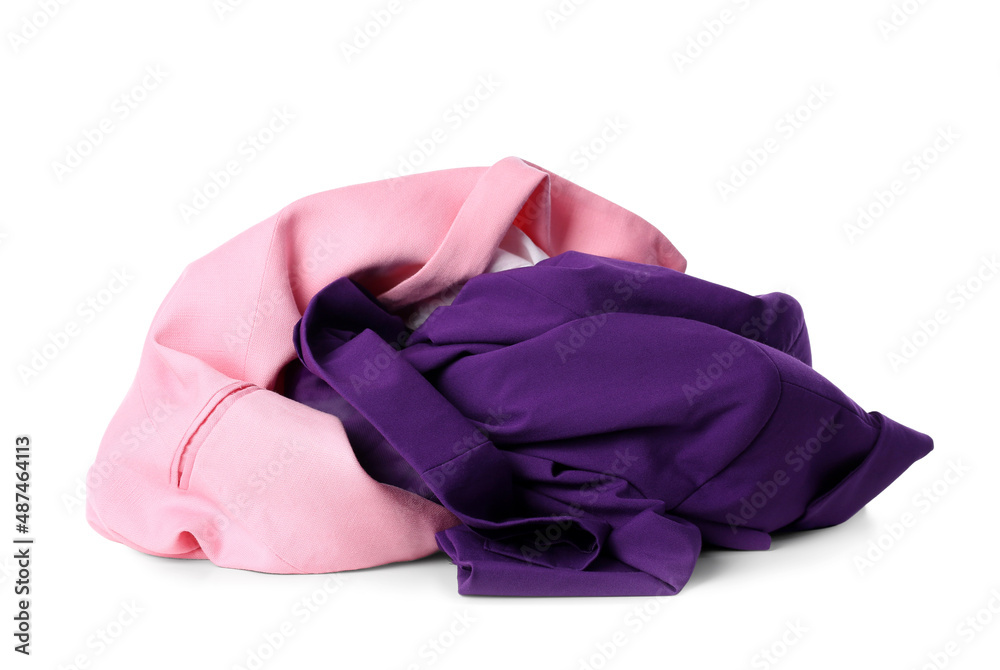 Crumpled female jackets on white background